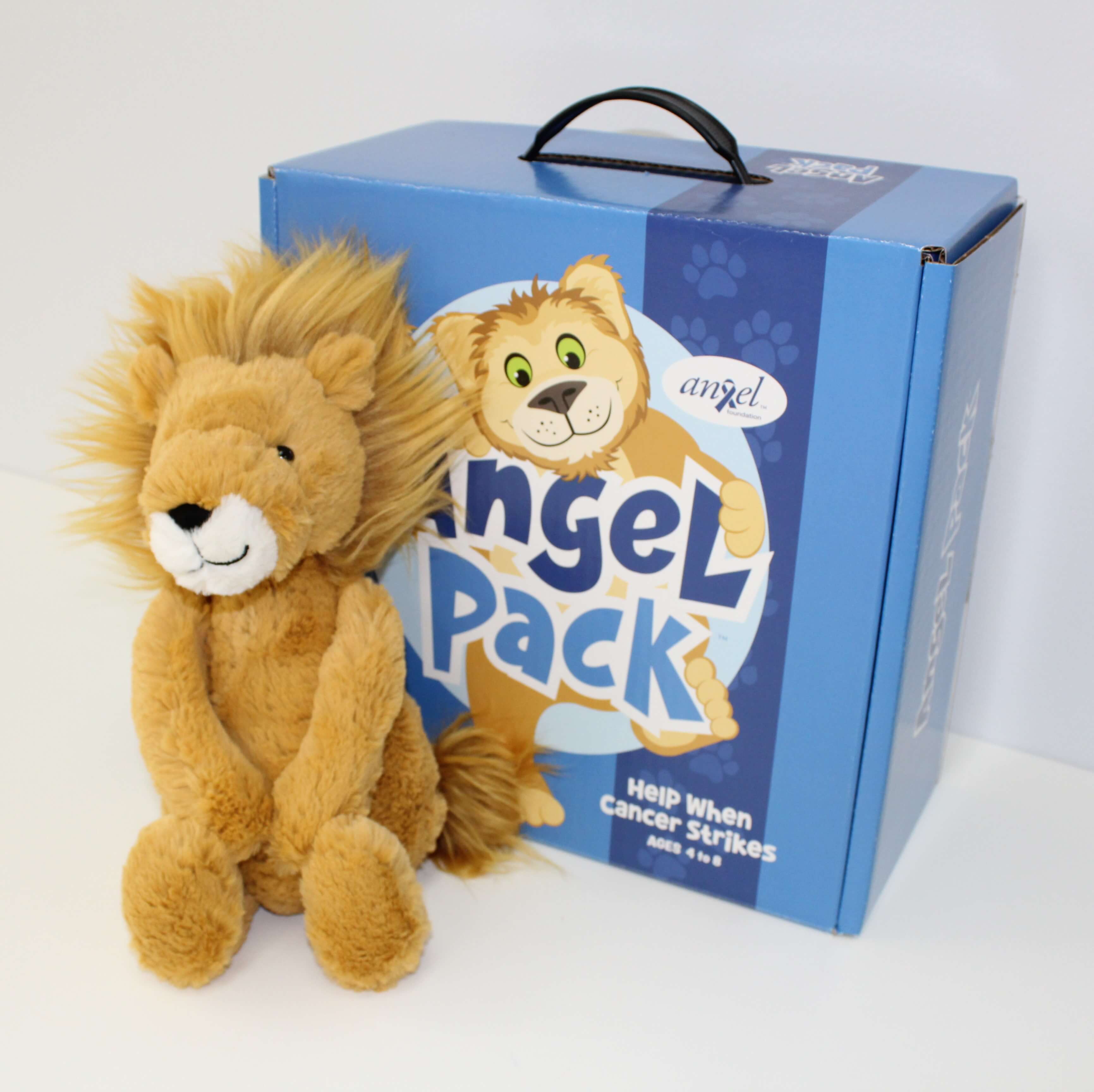 A smiling stuffed lion leaning on a blue box titled 
