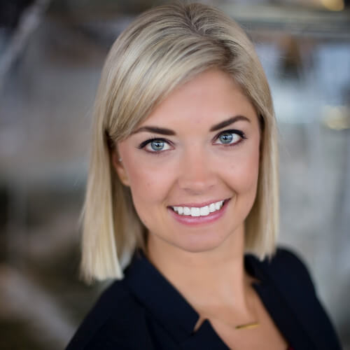 A headshot of Ashley MacHolda