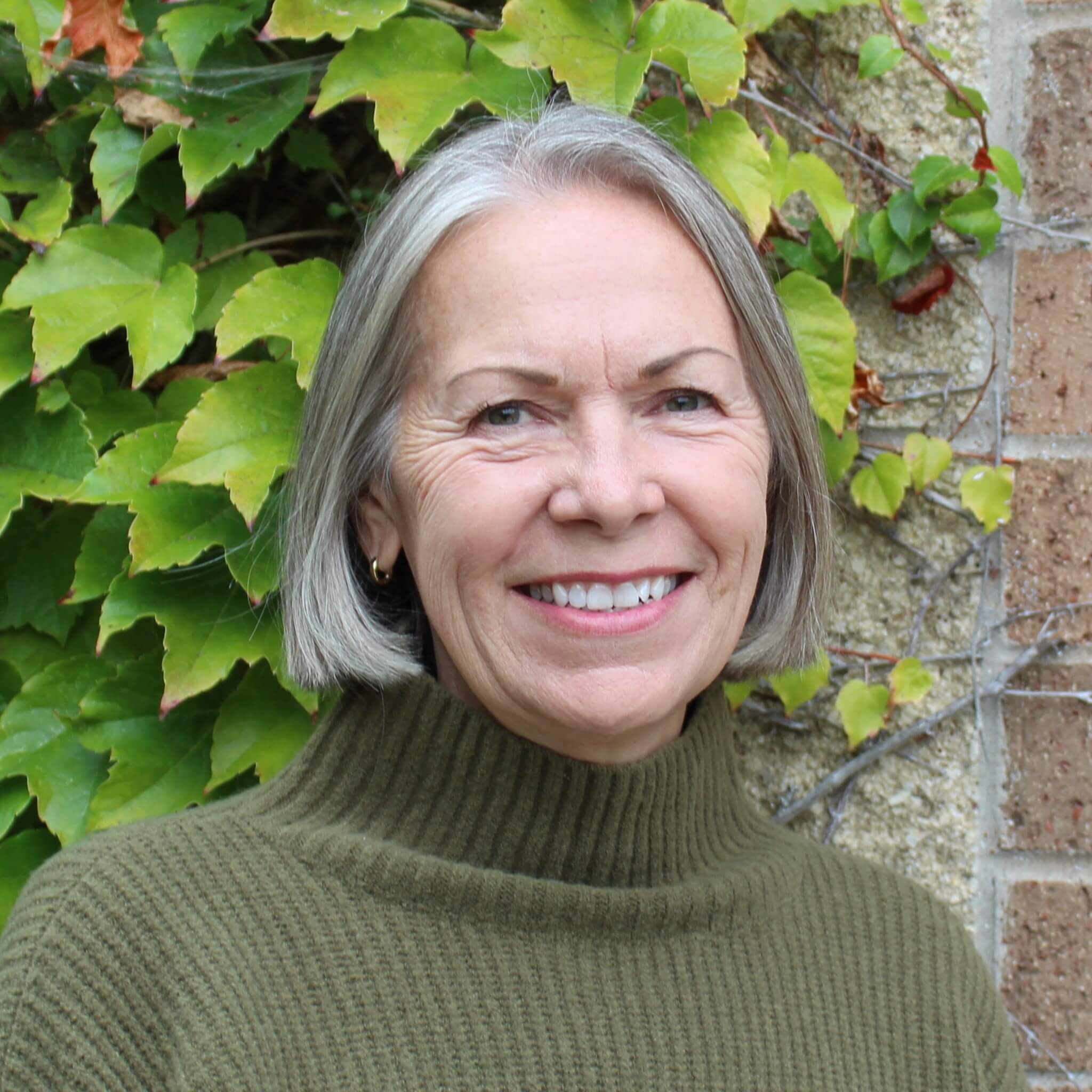 A headshot of Kathy Tolo