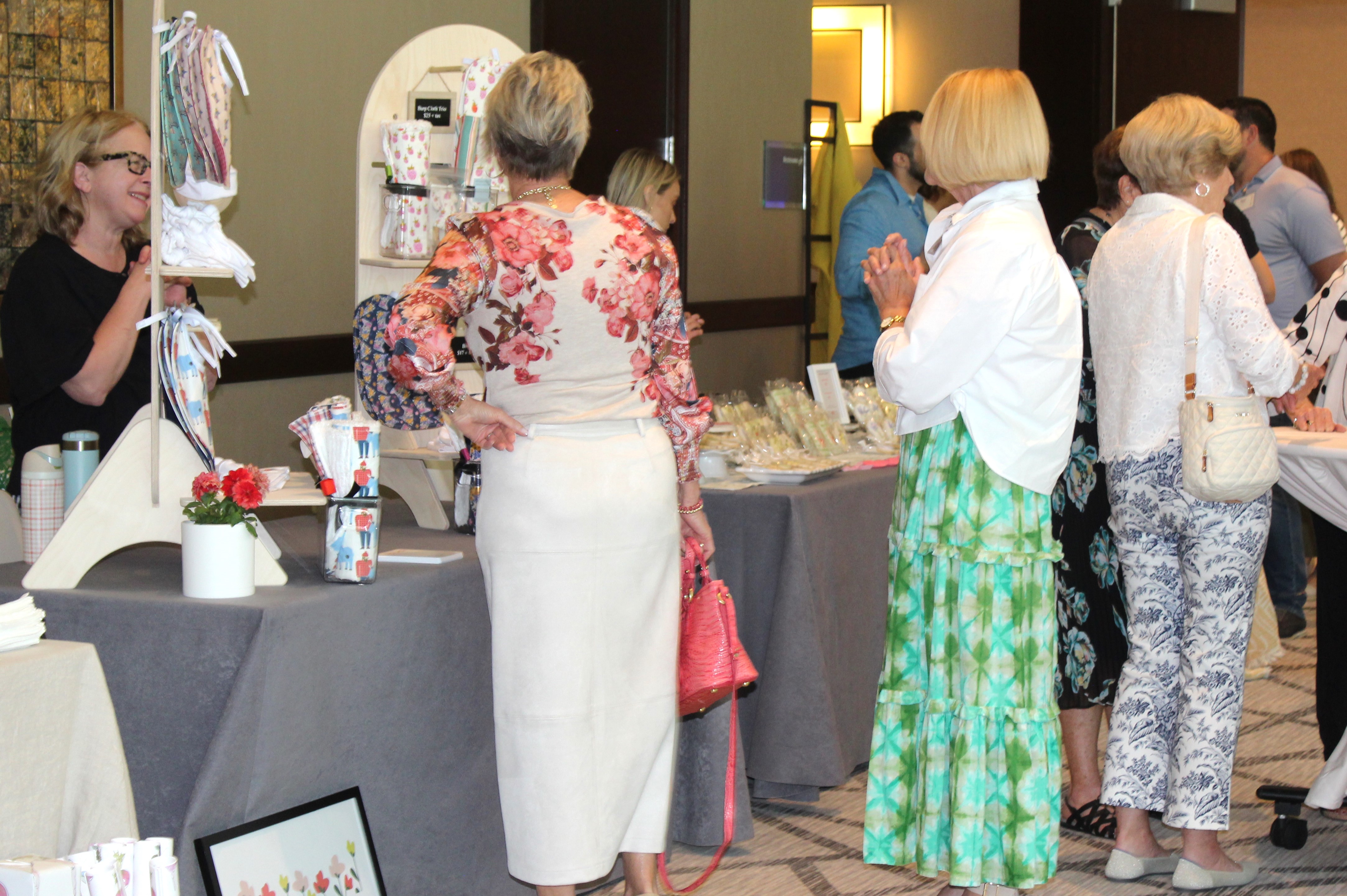 Guests browsing vendor booths